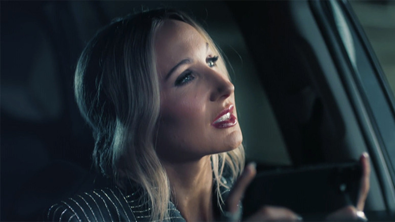 Nikki Glaser sitting in a car at the 2026 Golden Globes