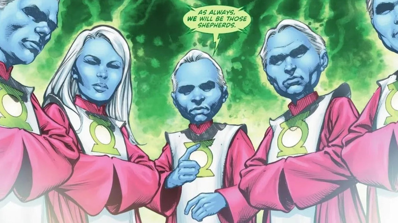 blue skinned aliens in red, green, and white robes stand in a circle