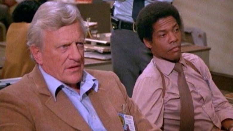 Detective Jim McClain and Detective Jerry Cross in the police station on "McClain's Law"
