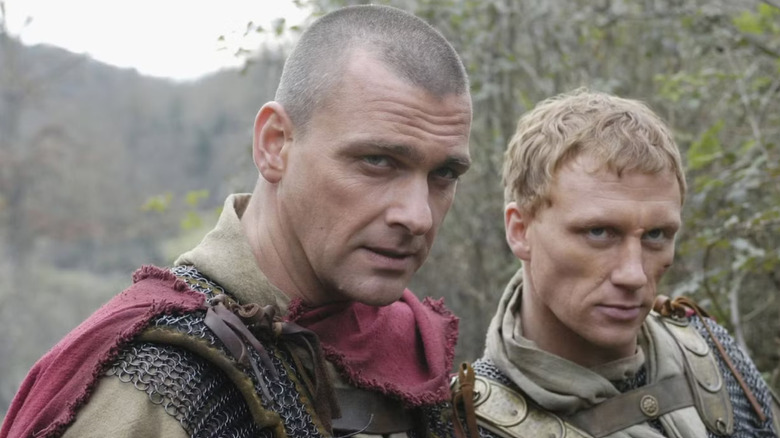 Two Romans look out on the battle field