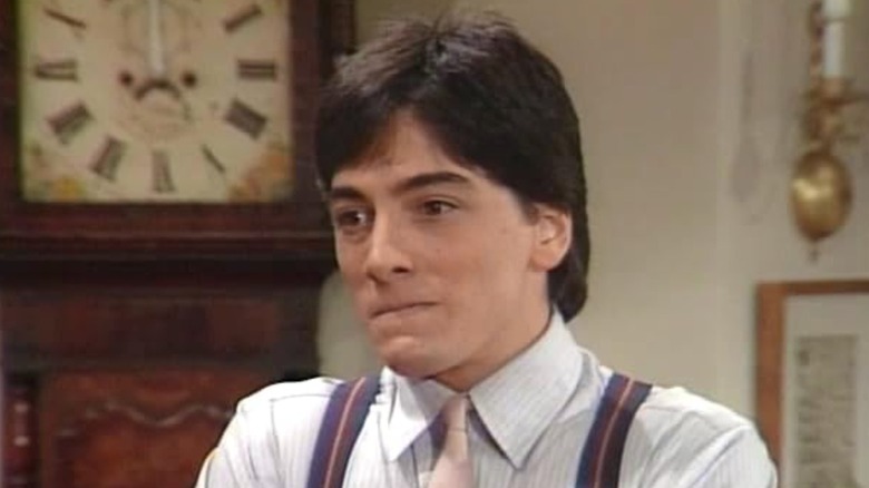 Scott Baio as Charles looking fed up on Charles in Charge