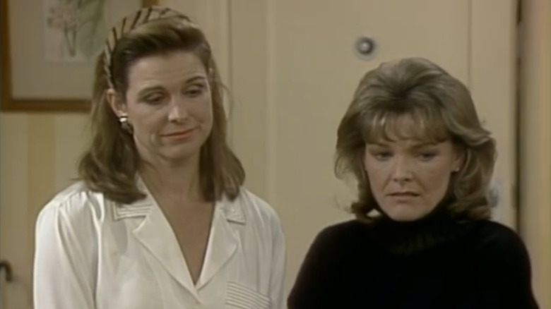 Jane Curtin's Allie and Susan Saint James' Kate looking worried in Kate & Allie
