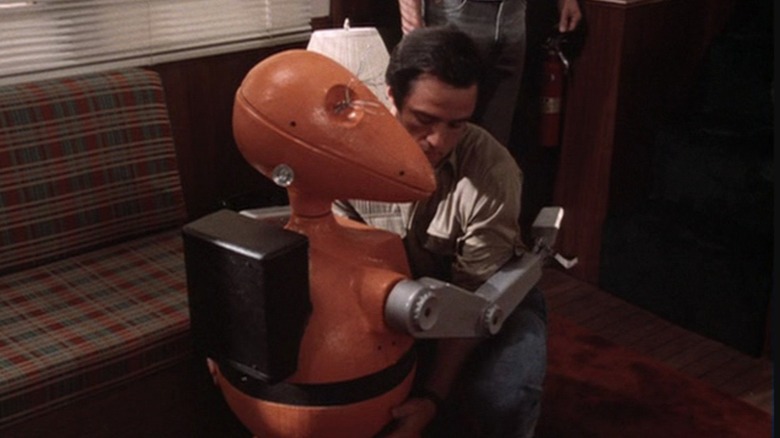 Joe Penny as Nick helps to fix the Roboz on the pilot episode of Riptide.