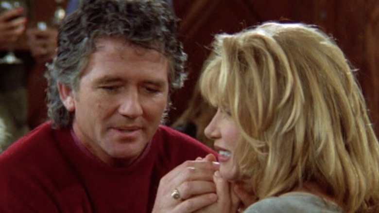 Patrick Duffy as Frank holds hands with Suzanne Somers as Carol in Step By Step