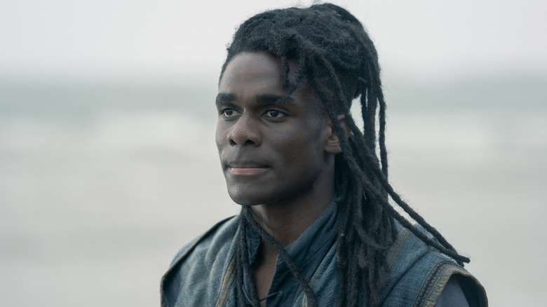 Clinton Liberty as Addam of Hull standing on the beach in House of the Dragon