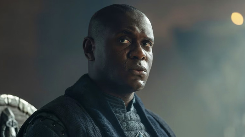 Abubakar Salim as Alyn of Hull sitting on the small council in House of the Dragon