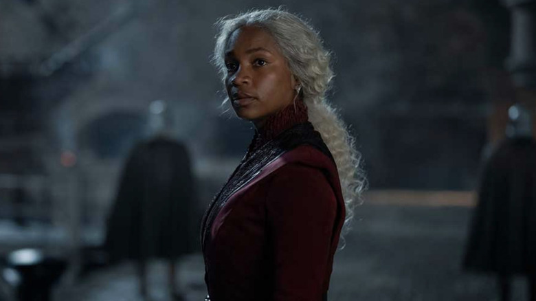Bethany Antonia as Baela Targaryen standing on a bridge looking serious in House of the Dragon