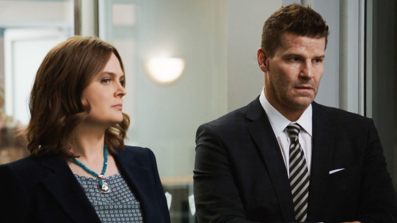 Bones (Emily Deschanel) and Seeley (David Boreanaz)  standing next to each other on Bones