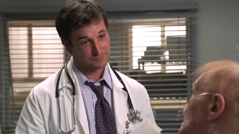 Noah Wyle's John Carter with a patient on ER