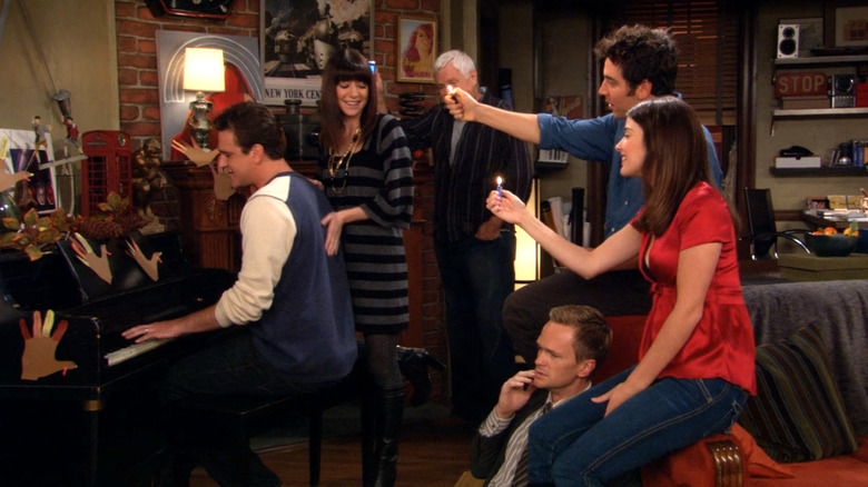 Marshall singing "You Just Got Slapped" to the gang in How I Met Your Mother.