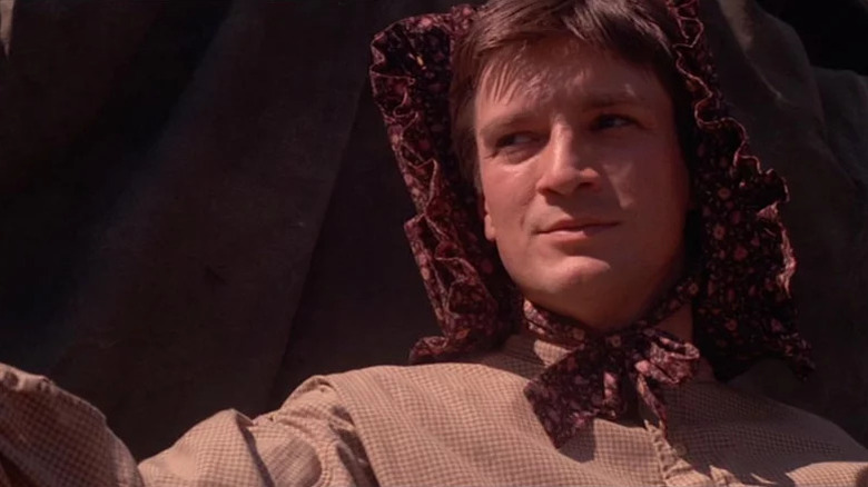 Mal Reynolds wearing a pretty bonnet on Firefly (2002-2003)