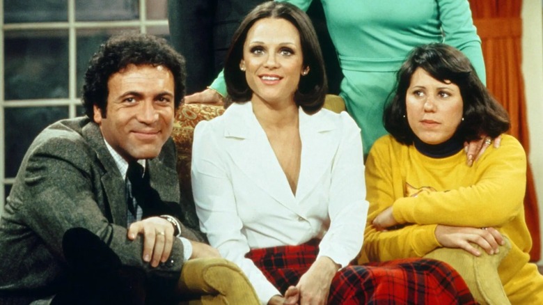 Joe, Rhoda, and Brenda all sitting on the couch