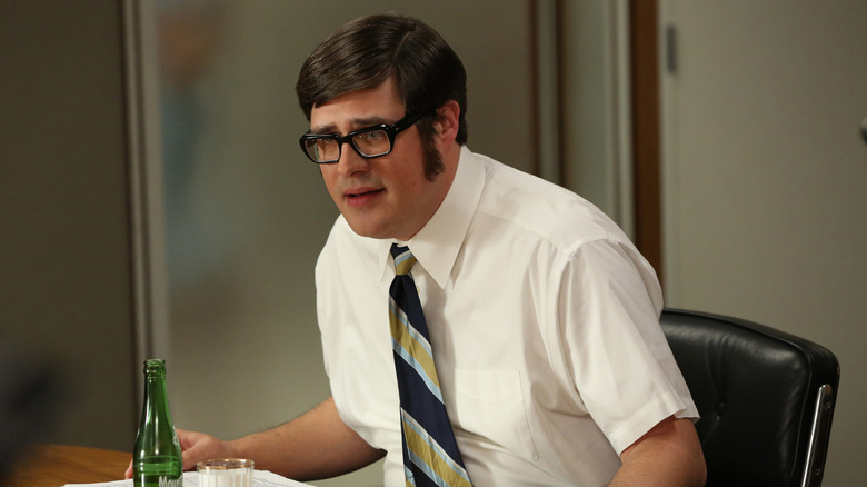 Harry Crane looking stressed in an office in "Mad Men" (2007)
