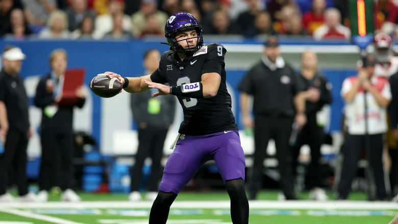 Ken Seals of the TCU Horned Frogs drops back to pass
