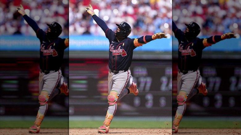 Ronald Acuna Jr. of the Atlanta Braves running with hands up