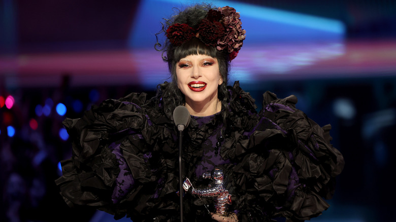 Lady Gaga accepting an award on stage at the 2025 MTV Video Music Awards