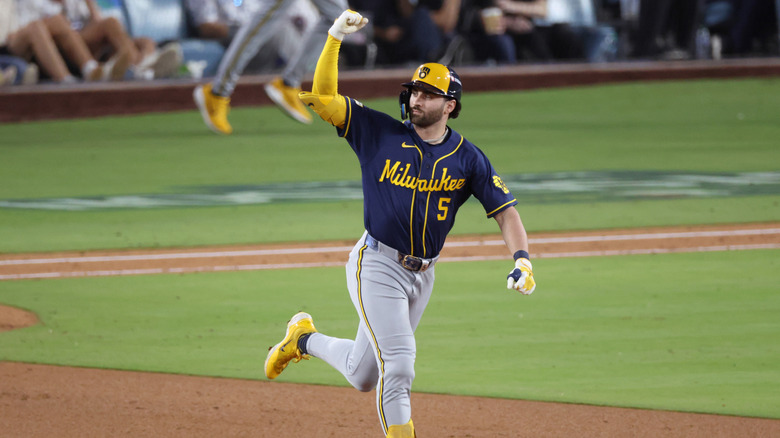 Garrett Mitchell celebrates a home run in Game 4 of the NLCS