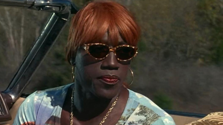 Noxeema Jackson (Wesley Snipes) looks on from a car in To Wong Foo, Thanks for Everything! Julie Newmar.