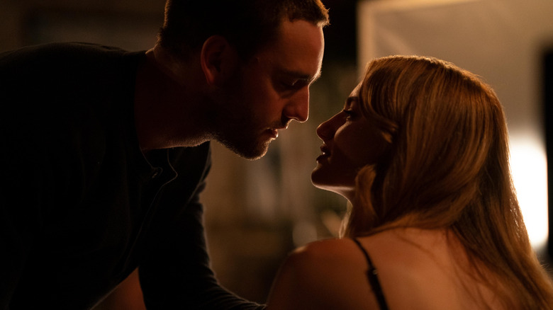 Stephen (Jackson White) leaning in to kiss Lucy (Grace van Patten) on Tell Me Lies