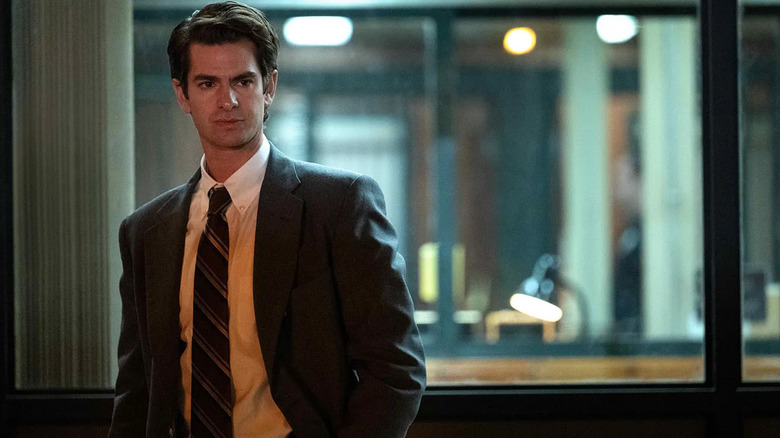 Jeb (Andrew Garfield) looking at something wearing a suit on Under the Banner of Heaven