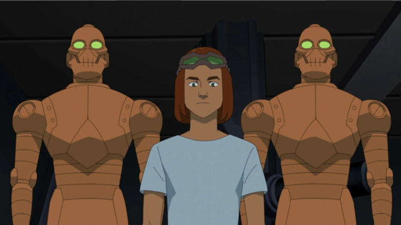 Robot standing with his two bronze machines in Invincible