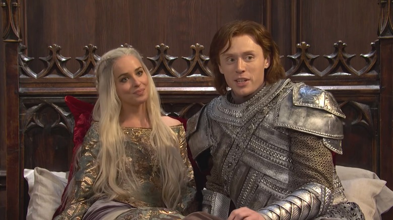 Dakota Johnson and Ben Marshall in fantasy costumes during a "Saturday Night Live" sketch