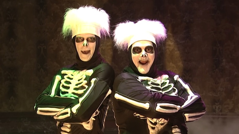 Two skeleton sidekicks speaking