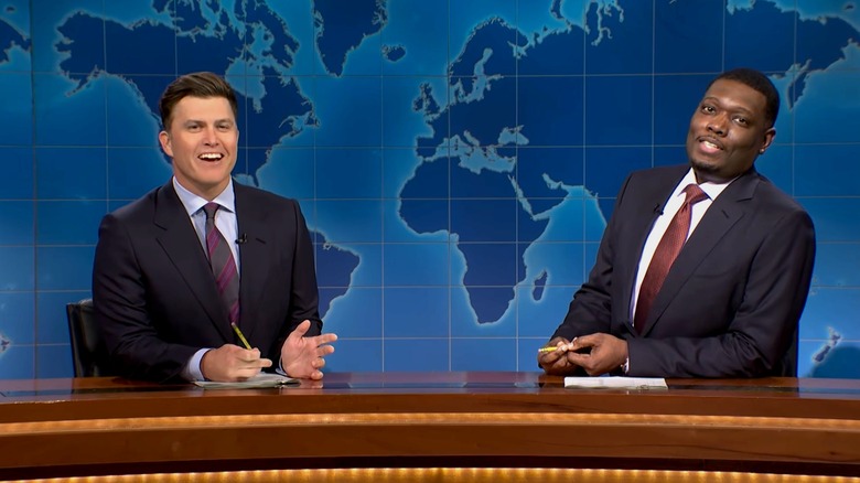 Colin Jost and Michael Che hosting "Weekend Update" segment of "Saturday Night Live"