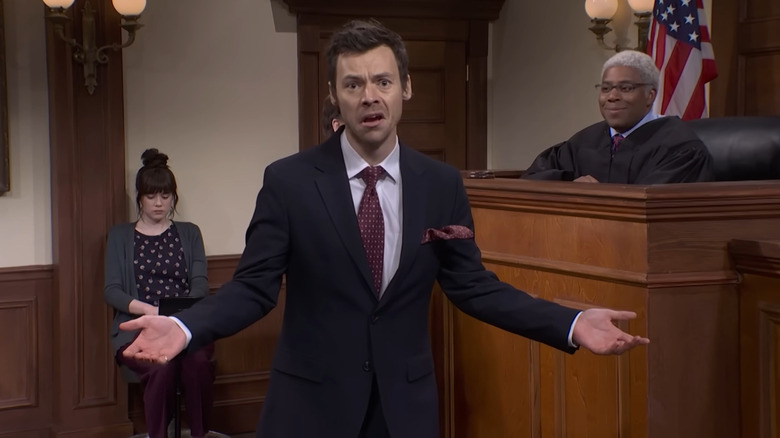 Kenan Thompson smiling at Harry Styles on Saturday Night Live