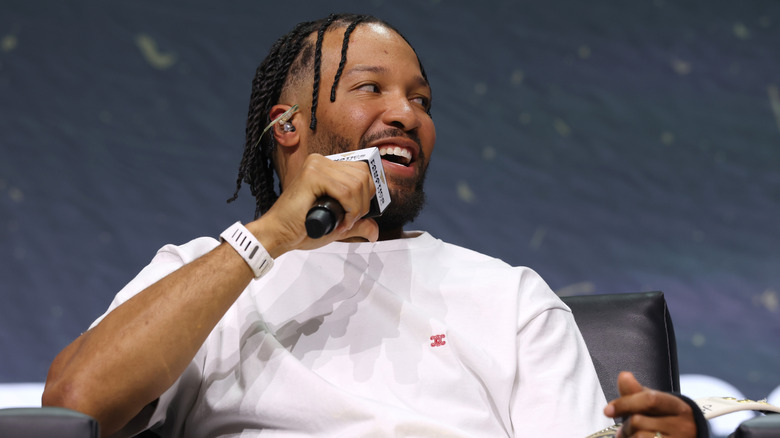 Jalen Brunson speaking into a microphone