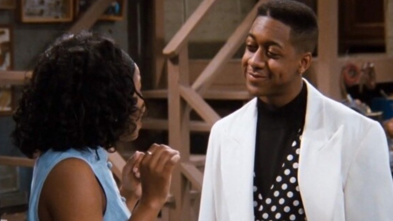 Laura Winslow (Kellie Shanygne Jackson) looking surprised by Stefan Urquelle (Jaleel White) on Family Matters