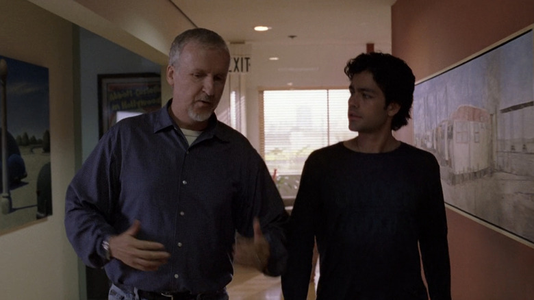 James Cameron stands beside Vincent Chase while talking about Aquaman on Entourage (2004-2011)