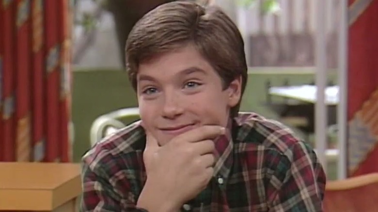 Matthew Burton sits and scheme on "It's Your Move" (1984-1985)