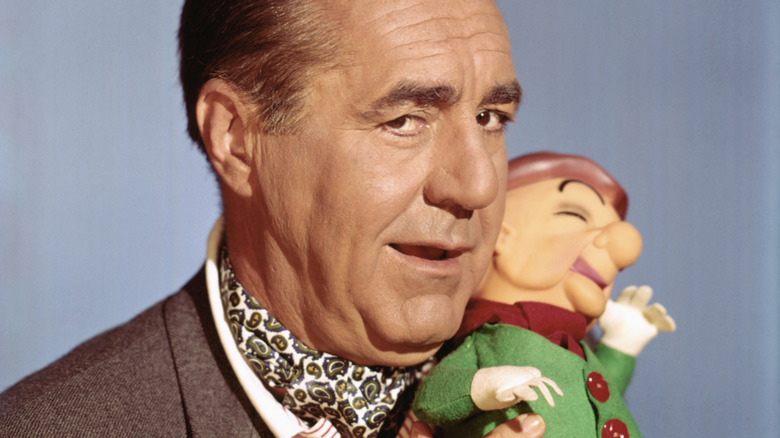 Jim Backus holding a Mr. Magoo doll