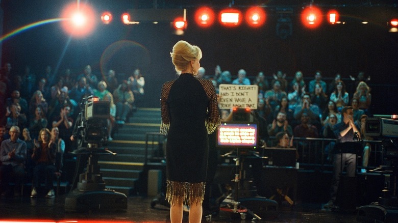 Deborah (Jean Smart) standing in front of her late night audience on Hacks