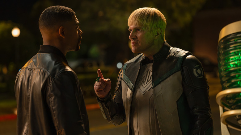 John Stewart (Aaron Pierre) and Guy Gardner (Nathan Fillion) talking in Lanterns