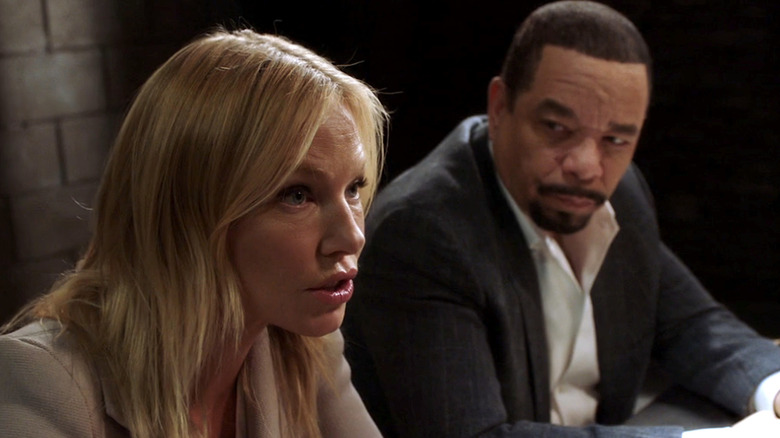 Amanda Rollins sitting next to Fin Tutuola in an interrogation room in Law & Order: SVU