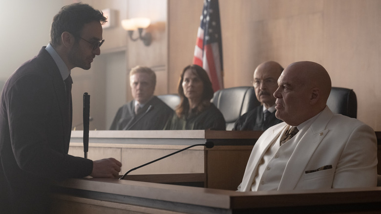 Wilson Fisk sitting at the witness stand facing Matt Murdock in Daredevil: Born Again