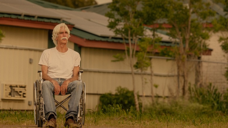 T.L. sits in a wheelchair and looks sad in Landman Season 2, Episode 1