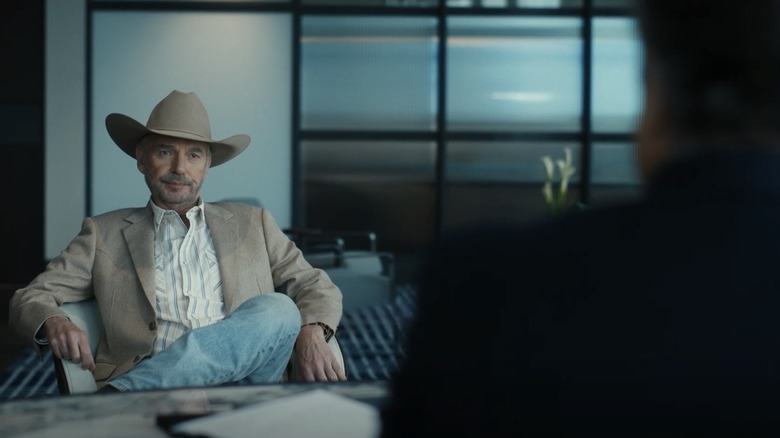Billy Bob Thornton as Tommy sits across a desk from Andy Garcia as Gallino in Landman