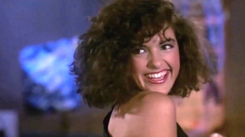 Mariska Hargitay as Audine Higgs dancing and smiling at a bar in a scene from the CBS series "In the Heat of the Night."