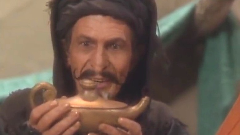 Leonard Nimoy as Evil Magician looking at lamp on Faerie Tale Theatre