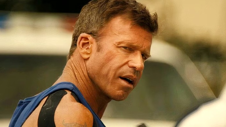 Cody Spears (Taylor Sheridan) looking at someone on "Lioness"