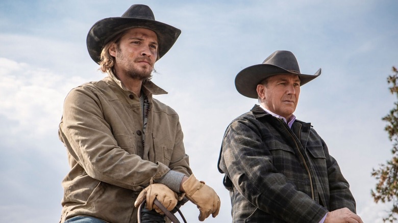 Kayce and John Dutton side by side on horseback