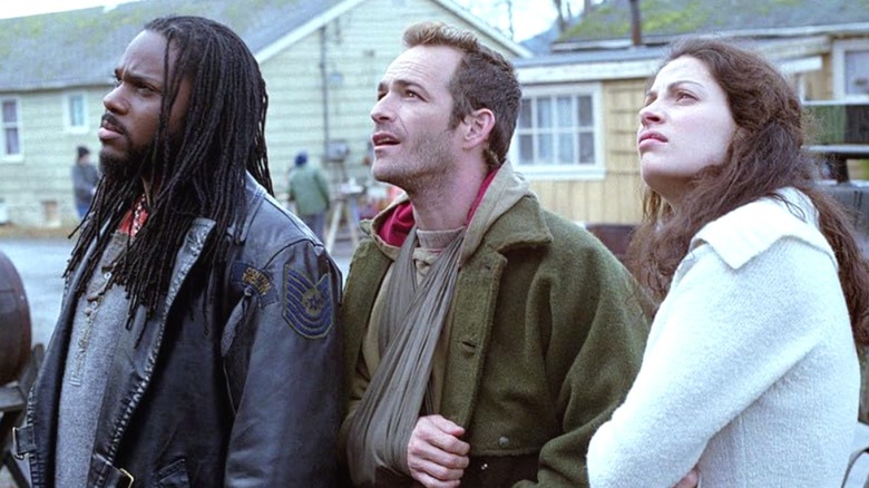 Kurdy standing next to Jeremiah, who has his arm in a sling, in "Jeremiah"