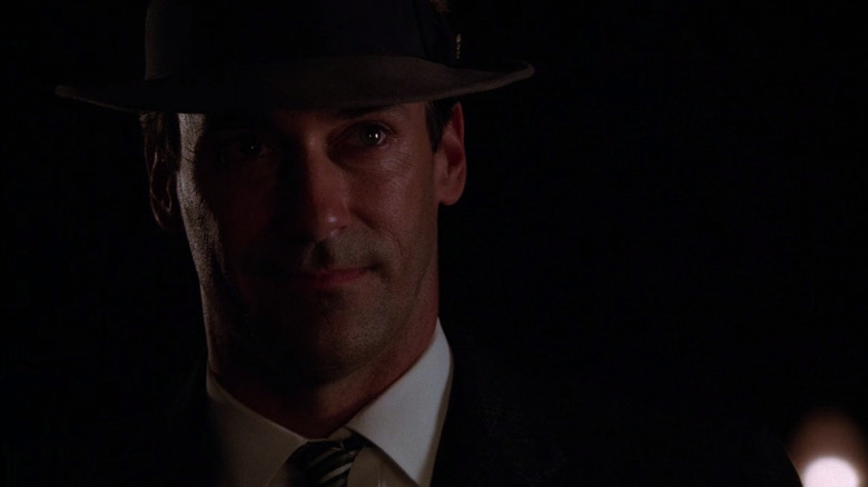 Don Draper stands in the dark in "Mad Men"