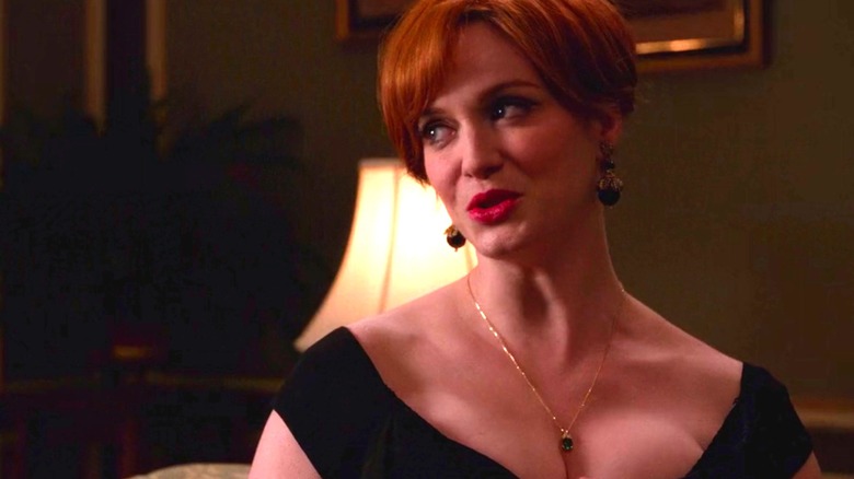 Joan has a drink with a client in "Mad Men"