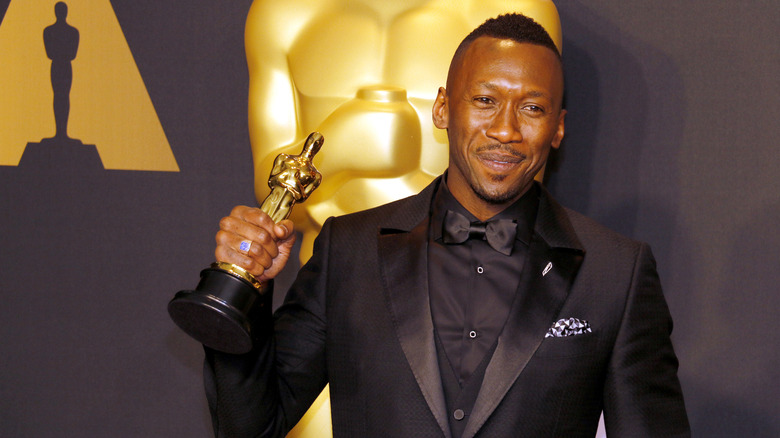 Mahershala Ali with one of his two Academy Awards.