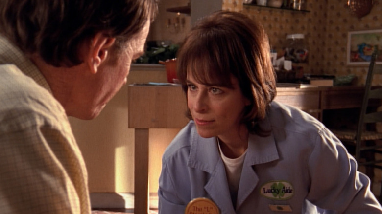 Bryan Cranston (Hal) and Jane Kaczmarek (Lois) talk strategy during Malcolm in the Middle.