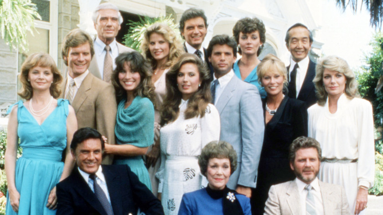 the cast of "Falcon Crest" (1981) pose for a promotional portrait